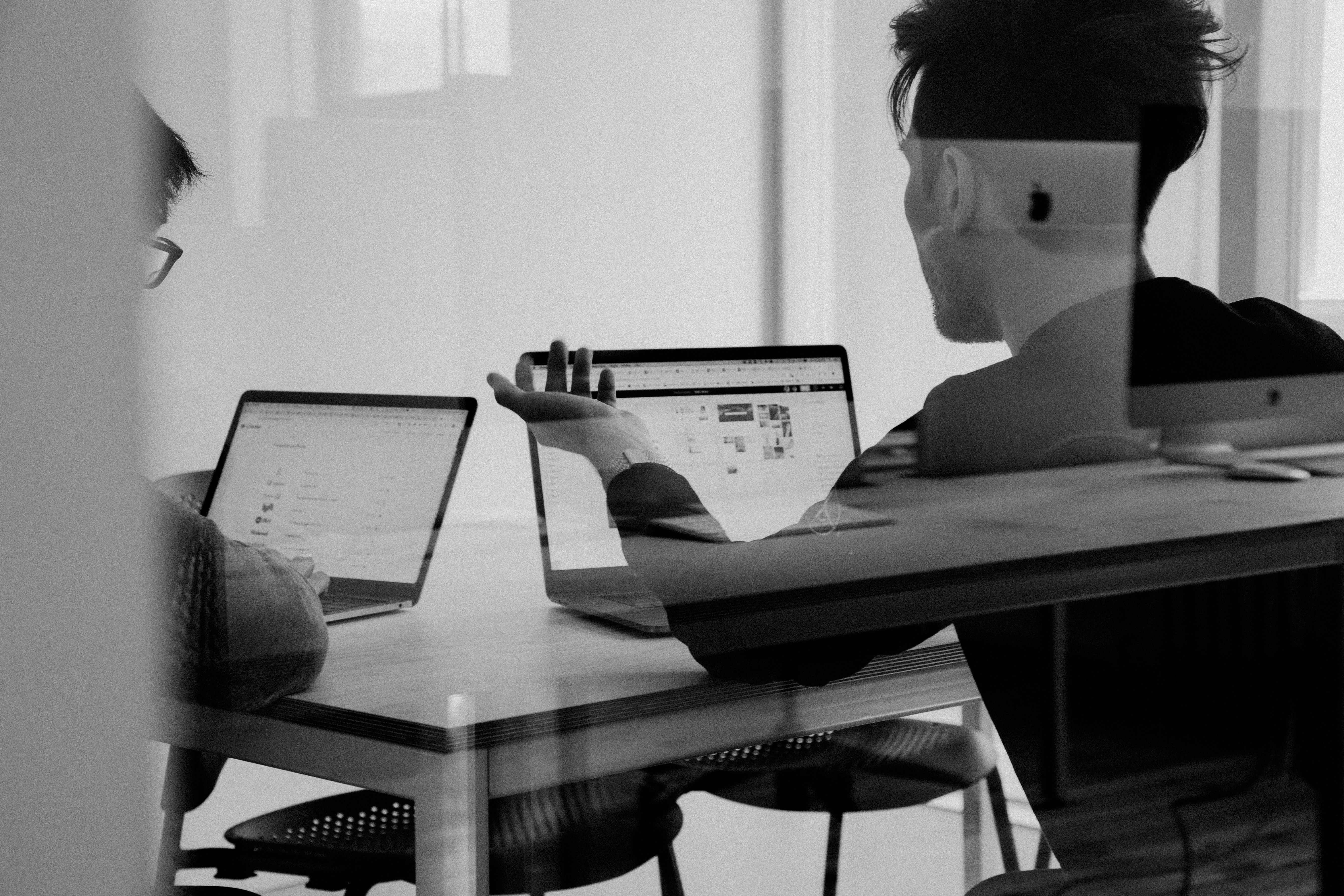 Adjacent studio — two people working on a project together.